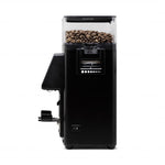 Black coffee grinder with a clear container of coffee beans on a white background